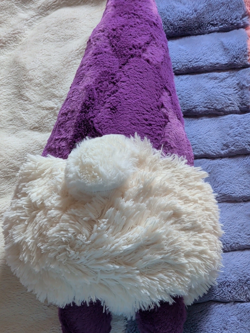 Plush Accent Pillow in Purple and Cream